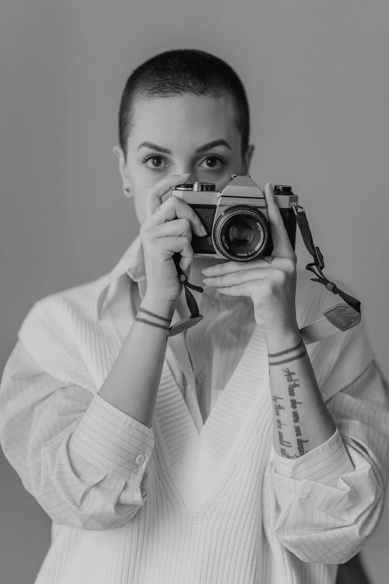 Female photographer with photo camera